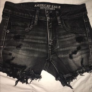 High waisted distressed black shorts